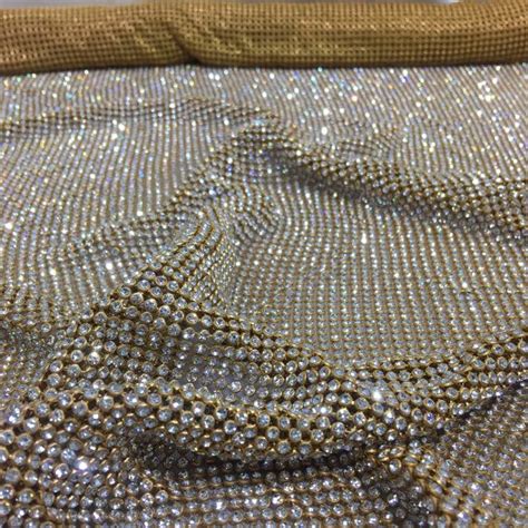 working with rhinestone metal mesh fabric|rhinestone fabric embellishments.